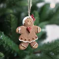 Décoration de Noël en résine bonhomme de pain d'épices avec nœud rouge et glaçage - Bonhomme En Pain D'épice F Modèle 33g