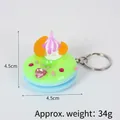 Porte-clés donut réaliste vert et bleu avec crème violette et perles, taille 4,5 cm - Décoration beignet à l'orange (avec porte-clés) / 4.50cm / Vert Herbe