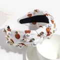 Detail view of white knotted headband with orange basketball print, pearls and rhinestones - White (Basketball)