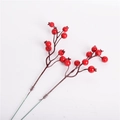 Macro detail of glossy red artificial Christmas berries on brown branches for DIY wreaths - Red Berry