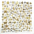 Macro detail of assorted gold and silver DIY alloy charms with intricate vintage patterns - HK441-Gold & Silver Mixed-200pcs