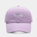Close-up of lavender cotton baseball cap featuring white 'mom' embroidery and textured fabric - Adjustable / Light Purple