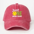 Detail view of Just One More Game print on red washed cotton baseball cap with pickleball icon - Watermelon red
