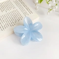 Light blue flower hair claw clip with translucent finish and elegant floral design - Blue