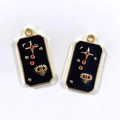 Golden rectangular tarot charms with black enamel, star pattern and all-seeing eye motifs - Eye