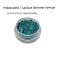Makro-Detail von lasergruen-blauem Glitzerpuder mit 0,2 mm und 1 mm Mischpartikeln - Laser Aquablau