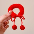 Elastic red plush hair tie with cute faux fur balls and a charming bow decoration - Bow Pom Pom Style / Red
