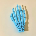 Gothic bright blue skeleton hand hair clip for Halloween party in a plastic finish - Blue