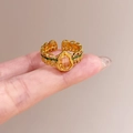 Golden hollow lace open ring with green enamel and a pear-shaped amber gemstone - Pear Amber Enamel