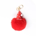 Christmas Santa hat pom-pom keychain with red plush ball and golden clasp on white background - Christmas Hat