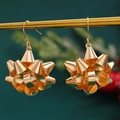 Festive gold metal bow drop earrings for women with a high polish finish and elegant design - Gold Bowknot (H-229)