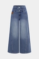 Detailansicht der Wide-Leg-Jeans mit einzigartigem Doppelknopf- und Doppelbund-Design - S / Blau