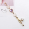 Detail of DIY phone case charm with white enamel camellia, purple heart crystal and pearl - Purple