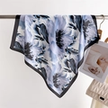 Detailed close-up of blue floral print silk scarf hanging with neat black stitched edges - 66-70cm / Black (FJ967-4)
