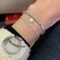 Silbernes zweischichtiges Armband mit runden Perlen und einem lächelnden Stern-Anhänger - Doppelschichtige Lächelnder Stern