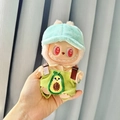 Plush doll in yellow shirt and green overalls with avocado pocket for Labubu collectible - Avocado Overalls Two-piece Set + Green Bread Baseball Cap / First And Second Generation Keychains Are Compatible With La Cloth Dolls. Dolls Not Included.