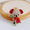 Close-up of cute koala keychain with red and white rhinestones on a wooden stand - Pendant Only / Red