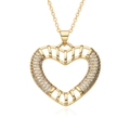 Close-up of heart-shaped hollow pendant with gold plating and sparkling white zirconias - Hollow Rhinestone Heart Style (h151)
