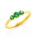 Classic gold titanium steel ring featuring three round-cut green gemstones in a prong setting - Gold Green Zirconia
