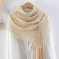 Beige crinkled cotton linen scarf for women featuring fringe edges and bubble texture - Beige