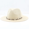 Close-up of Bohemian straw hat featuring real white shells and dark wooden beads trim - M (56-58cm) / Beige