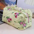 Light yellow floral quilted cosmetic bag with pink roses and ruffled top detail - Yellow Ruffled Floral