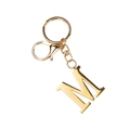 Detailed view of the gold letter M keychain with lobster clasp on a white background - Letter M