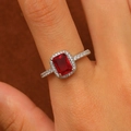 Close-up of a silver ring with red heart zircon stone and diamonds on finger - Silver Rectangle Red Ring (M-131)