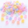 Set of mini macaron color butterfly hair claws for kids with pastel purple and yellow tones - Jelly Color Hand Style