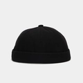 Vue détaillée du tissu en velours côtelé d'un bonnet docker noir sans bord. - Réglable / Noir