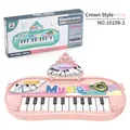 Pink crown-shaped 13-key electronic keyboard toy for kids with a built-in speaker - Crown / Pink