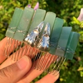 Handmade green crystal hair comb with silver skull accents and metallic wire wrapping - Green Aventurine + Silver Crow Skull
