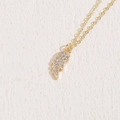 Elegant gold necklace featuring a wing-shaped pendant set with sparkling cubic zirconia - White Wing (Platinum Plated)