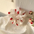 Elegant white scrunchie with cute strawberry pattern on soft textured fabric background - White Strawberry