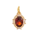 Golden pendant with oval red gemstone and clear zircon accents on white background - January Pendant (Red Gemstone)