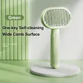 Green self-cleaning pet brush with wide head and massage needles for shedding grooming - Green