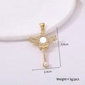 Golden wing pendant detail with cubic zirconia and pearl, 3.4cm size macro view - Cross Style O