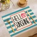 Detalle de mantel individual de lino con estampado Hello Sunshine y pelota de playa - Hello Sunshine Pelota de Playa
