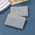 Detail of two translucent leaf-shaped silicone molds for DIY cake decorating and crafts - Multi-Hole Leaf Vein Texture Style (1)
