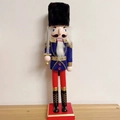 Traditional 30cm wooden nutcracker soldier in navy blue velvet uniform with silver sword - Blue Soldier with Sword