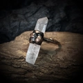 Macro detail of natural raw crystal stone ring with handcrafted hammered metal texture - White Crystal Hexagonal - Wrapped Middle