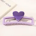 Detail of a dual-tone purple heart hair claw clip with a glossy resin finish - Heart Hollow Rectangle / Light Purple