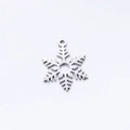 Macro detail of polished stainless steel snowflake pendant for DIY jewelry making - DY522-1 Steel Color Snowflake