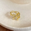 Detailed close-up of golden Pegasus ring with a chain-style adjustable band design - Gold Pegasus Style