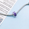 Silver snake chain bracelet featuring a purple enamel heart charm and colorful beads - Purple
