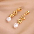 Orecchini a goccia vintage con perla barocca e pendenti lunghi in metallo dorato - Orecchini Lunghi con Perle Barocche