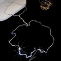 Close-up of sparkling rhinestone body chain with Y-shaped drop and lobster clasp - Silver-Teardrop Style