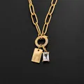 Elegant 14K gold plated stainless steel paperclip necklace with letter L tag and CZ charms - Letter I