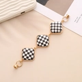 Checkerboard pattern zinc alloy bracelet with gold twist frames and magnetic clasp - K760 Square Black White Checkerboard