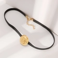 Detail of black leather choker with a gold spiral texture pendant and adjustable lobster clasp - Black Leather Gold Spiral Choker (0071)